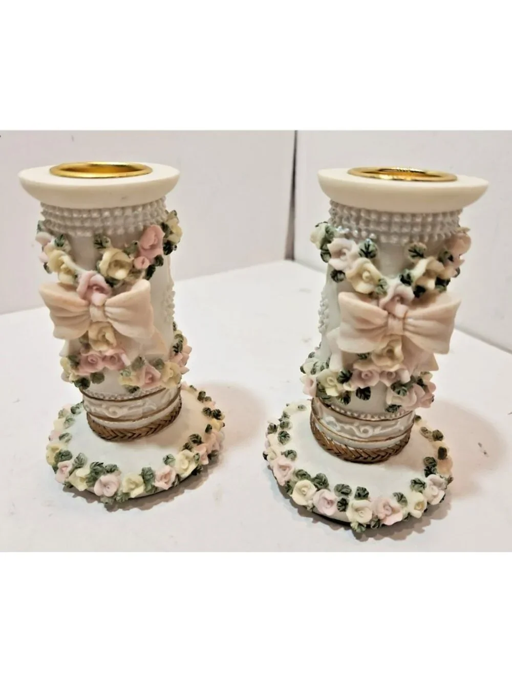 Pair of Sculpted Flower and Bows Ceramic Candlestick Holders Pastels Weddings